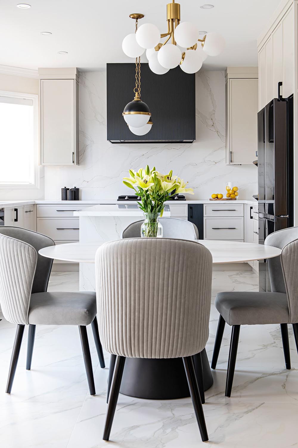 looking into a kitchen, kitchen table for 4 in foreground.
